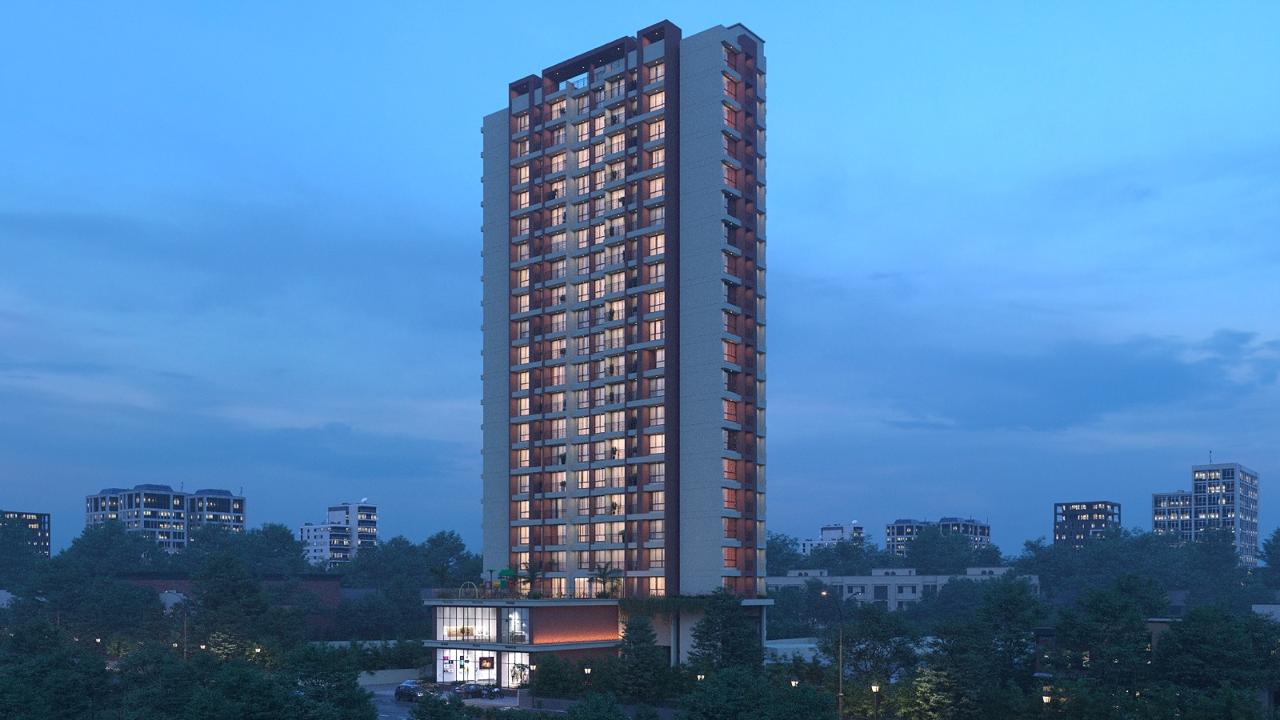 Mansarovar Residency tower illuminated at dusk against a blue-hour sky