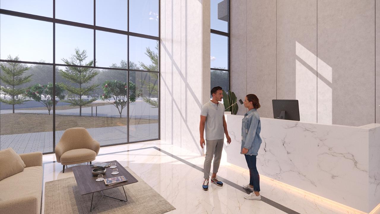 Double-height marble reception lobby